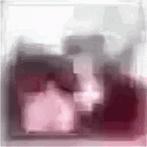 a blurry picture of a bottle of perfume and a bottle of lotion .