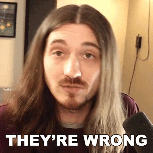 a man with long hair and a beard is saying they 're wrong .
