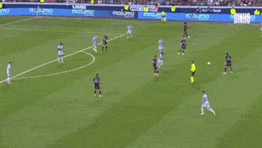 a soccer player with the number 10 on his jersey is kicking the ball
