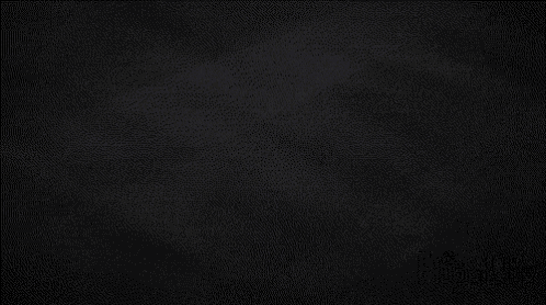 two white speech bubbles are floating in the dark on a black background .