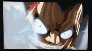 a close up of a cartoon character 's face with a huge smile on it .