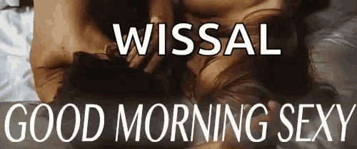 a man and a woman are having sex on a bed with the words `` wissal good morning sexy '' written above them .