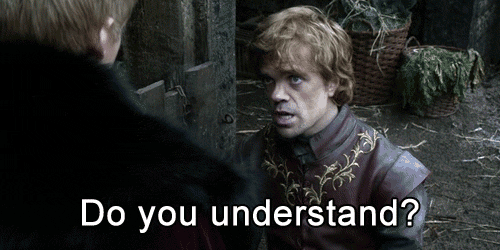 a man in a leather jacket is talking to another man with the words do you understand below him