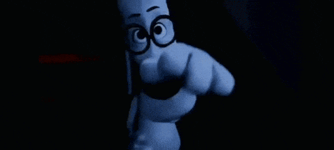 a black and white photo of a cartoon character wearing glasses and a mustache .