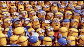 a bunch of minions are standing next to each other in a crowd