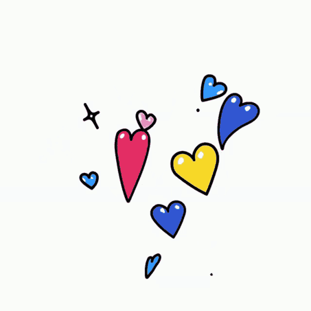 a bunch of different colored hearts are floating in the air