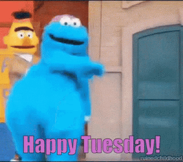 a cartoon character says happy tuesday while standing next to another cartoon character .