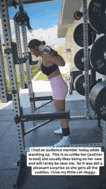 a woman is squatting with a dumbbell in her hand and a caption that says i had an audience member today