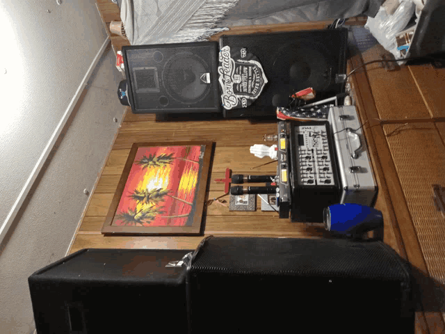 a room with speakers and a sign that says ' boston ' on it