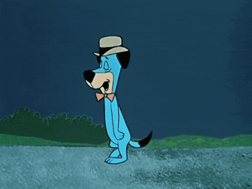 a blue dog wearing a hat and bow tie