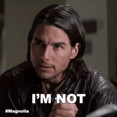 a man in a leather jacket says i 'm not in white letters