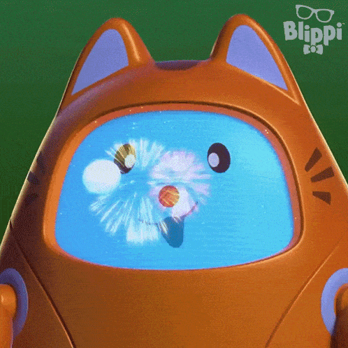 a close up of a blippi toy with fireworks displayed on its face