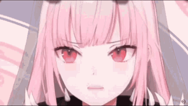 a close up of a pink haired anime girl with red eyes making a funny face .