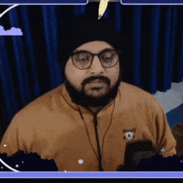 a man with a beard and glasses is wearing headphones and a hat .