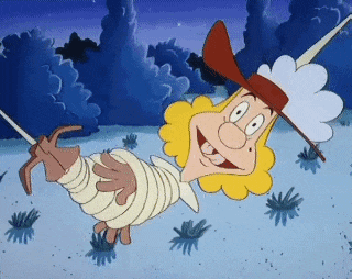 a cartoon character is wrapped in bandages and holding a stick