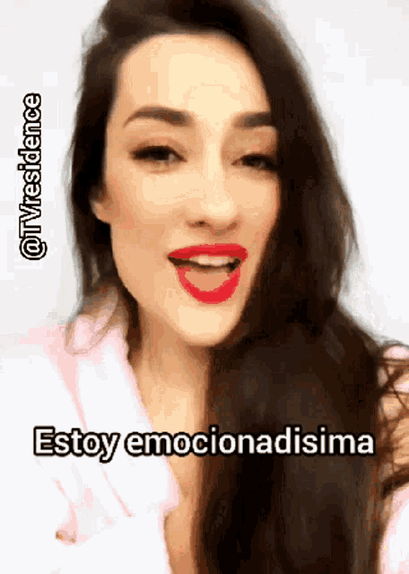 a woman with red lipstick says estoy emocionadisima in spanish