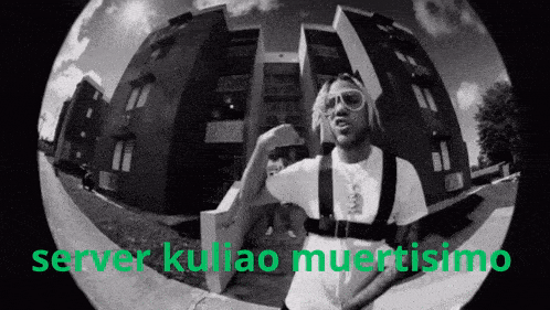 a black and white photo of a man with the words server kuliao muertismo in green