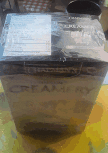 a box of creamery is wrapped in plastic