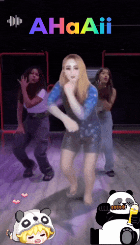 three women are dancing in front of a sign that says ahaaaii