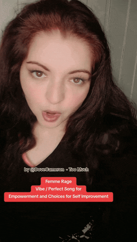 a woman singing a song called femme rage vibe / perfect song for empowerment and choices for self improvement