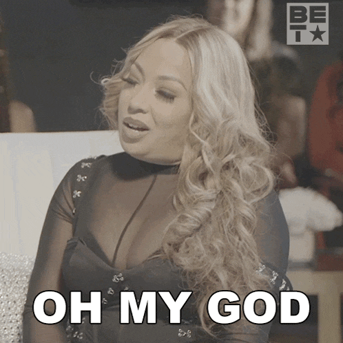 a woman says oh my god in a black dress