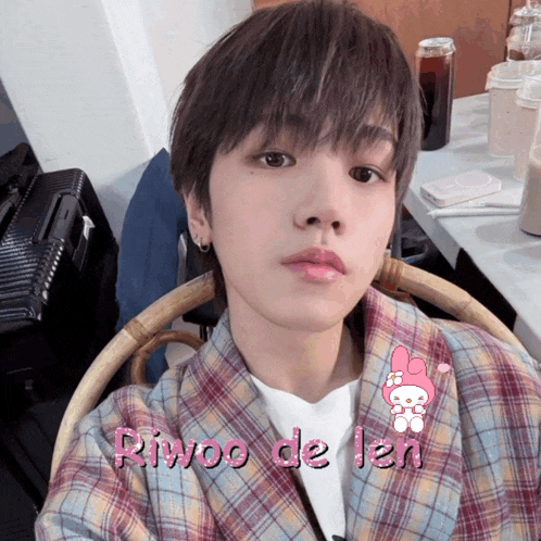 a picture of a boy with the name riwoo de len