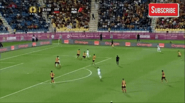 a soccer game is being played with a subscribe button