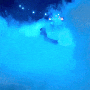a blue background with a silhouette of a person in the middle