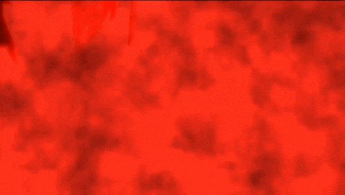 a red background with a blurred image of a snake