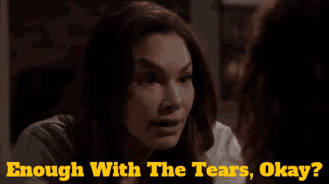 enough with the tears okay written next to a woman
