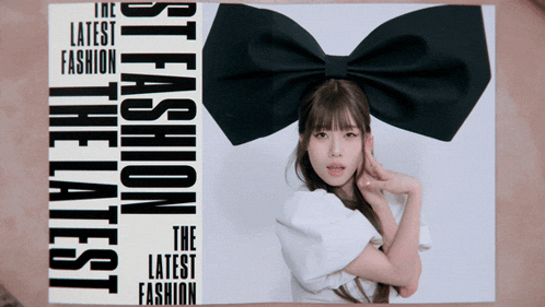 a woman with a black bow on her head is on the cover of a magazine that says the latest fashion