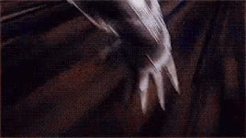 a close up of a person 's face in a pixelated anime .