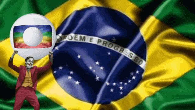 a man in a joker costume holds up a globe in front of a flag that says progresso