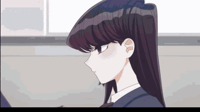 a close up of a girl 's face in a school uniform