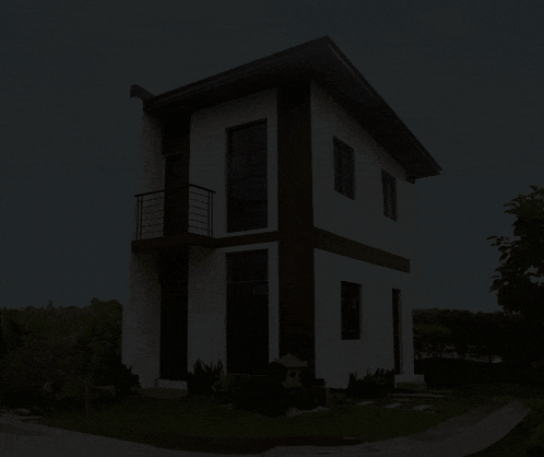 a congratulations sign with a picture of a house in the background