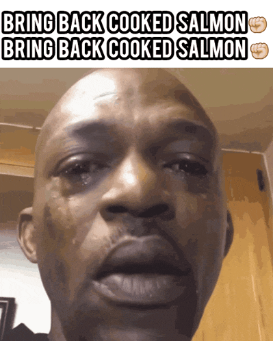 a man is crying with the words bring back cooked salmon below him
