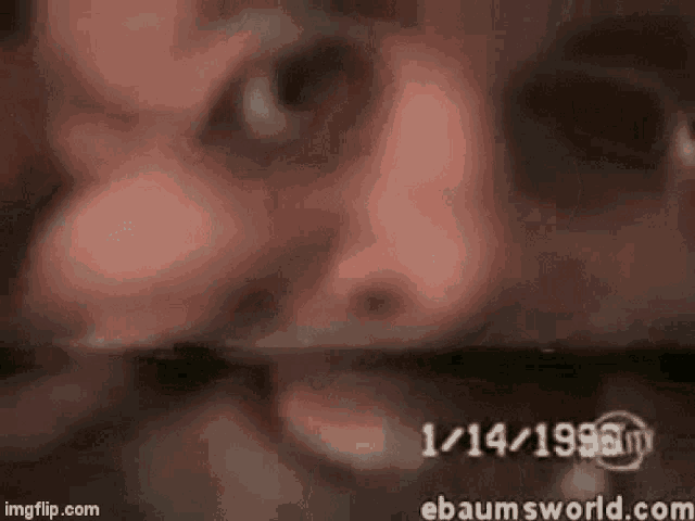 a close up of a person 's face with a date on the bottom of it .