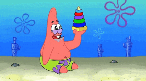 patrick star from spongebob squarepants is holding a toy pyramid