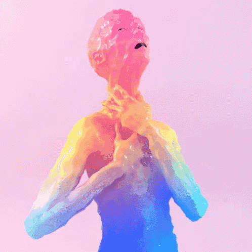 a statue of a man with a rainbow colored body
