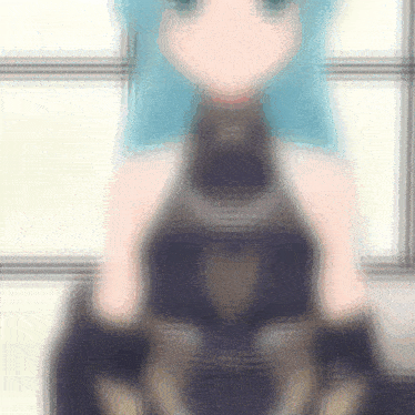 a blurry picture of a blue haired anime girl