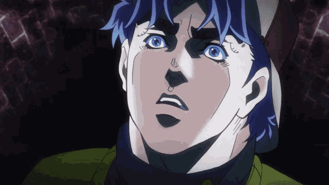 a close up of a person 's face with blue hair