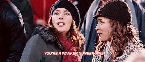 two women are talking to each other in a crowd and one of them says you 're a wanker number nine