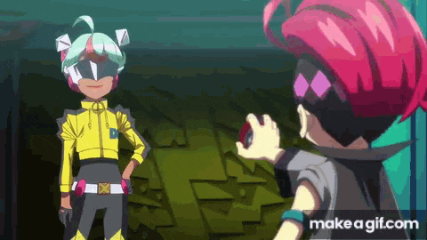 a couple of anime characters standing next to each other .