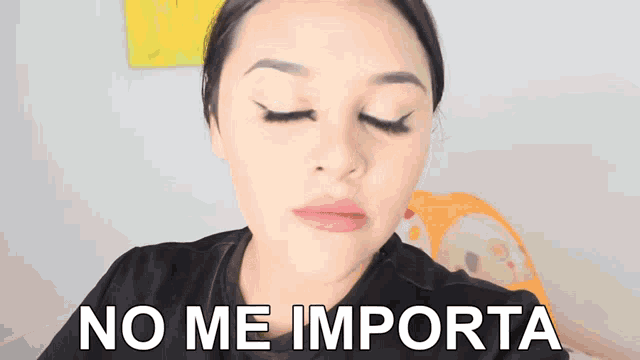 a woman with her eyes closed has the words no me importa written below her