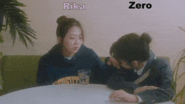 two girls are sitting at a table with rika and zero written on the bottom