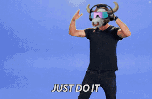 a man wearing a cow mask and headphones is dancing with the words just do it below him