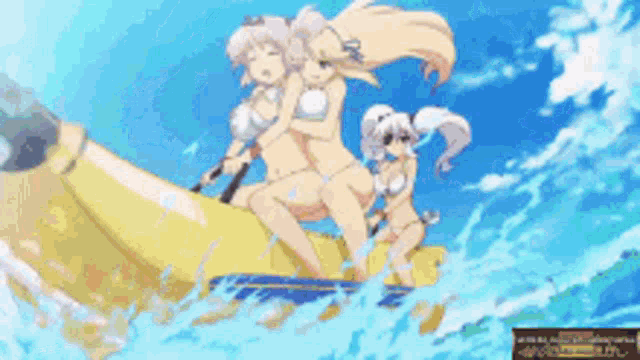 three girls in bikinis are riding a banana boat in the ocean