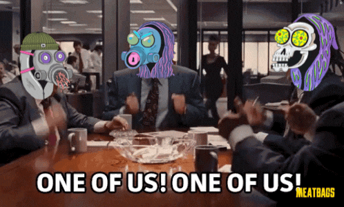 a group of people are sitting around a table and one of them says one of us