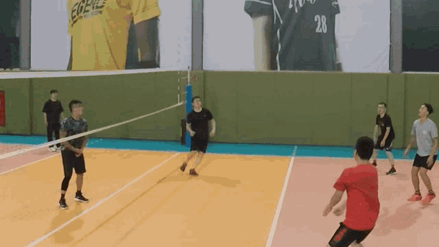 a volleyball player wearing a number 28 jersey