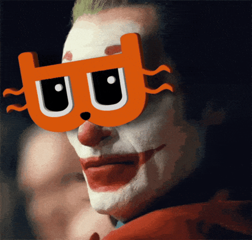 a close up of a person wearing a clown mask with a b on it